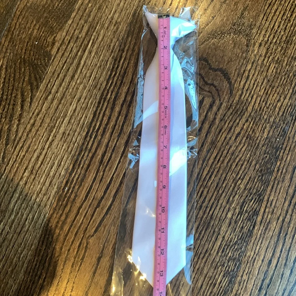 Boys white clip on tie.